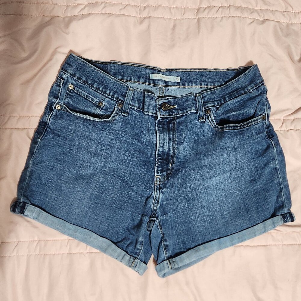 Women's Levi Mid Length blue jean shorts size 33